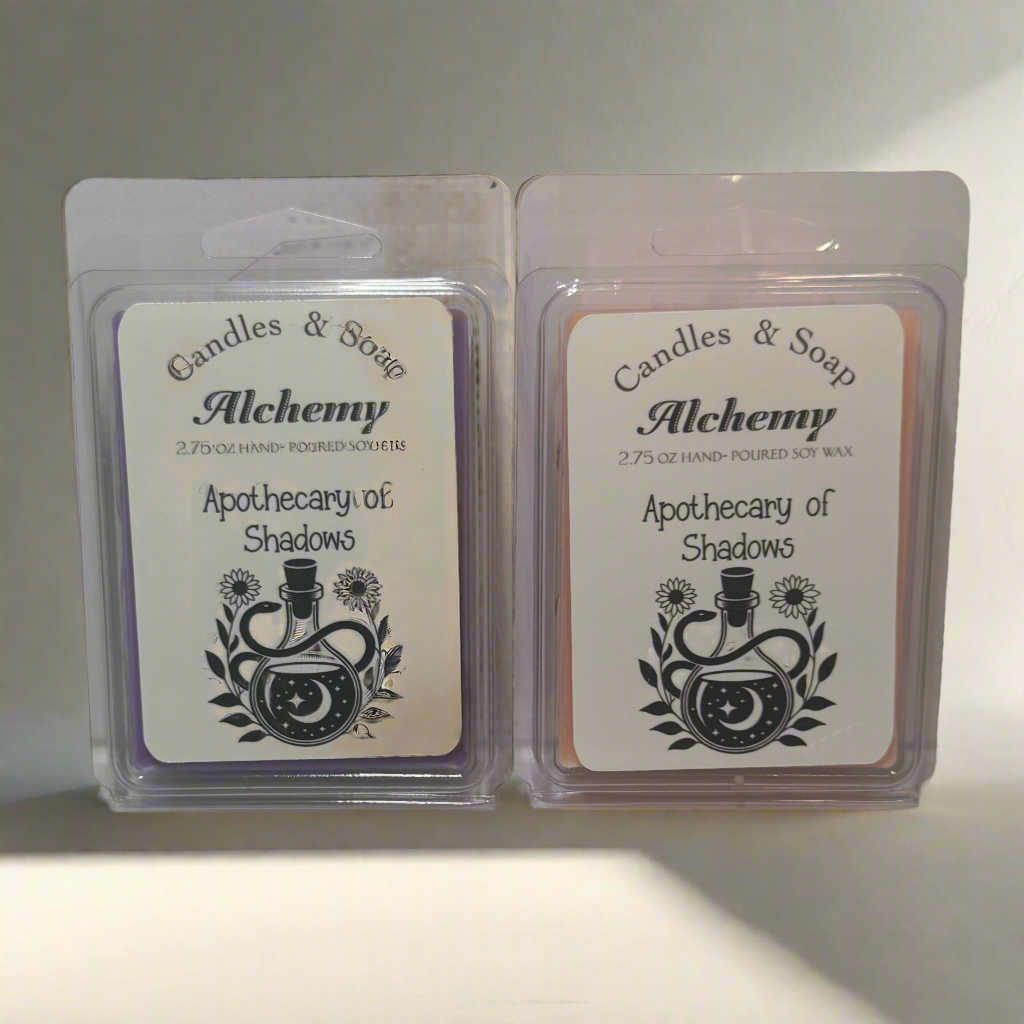 Two wax melts packaging labeled 'Candles & Soap Alchemy Apothecary of Shadows' on a white background.