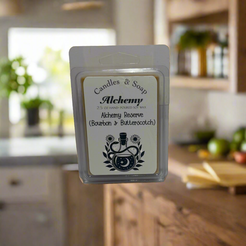 Wax melt package labeled 'Alchemy' on a white background