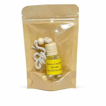 Diffuser bottle with wooden beads and rope in a kraft paper packaging on a white background