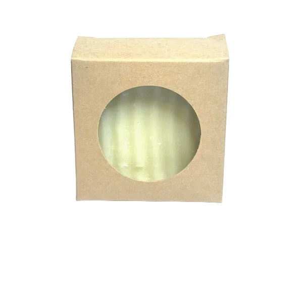 White soap bar in a square box with a clear window on a white background