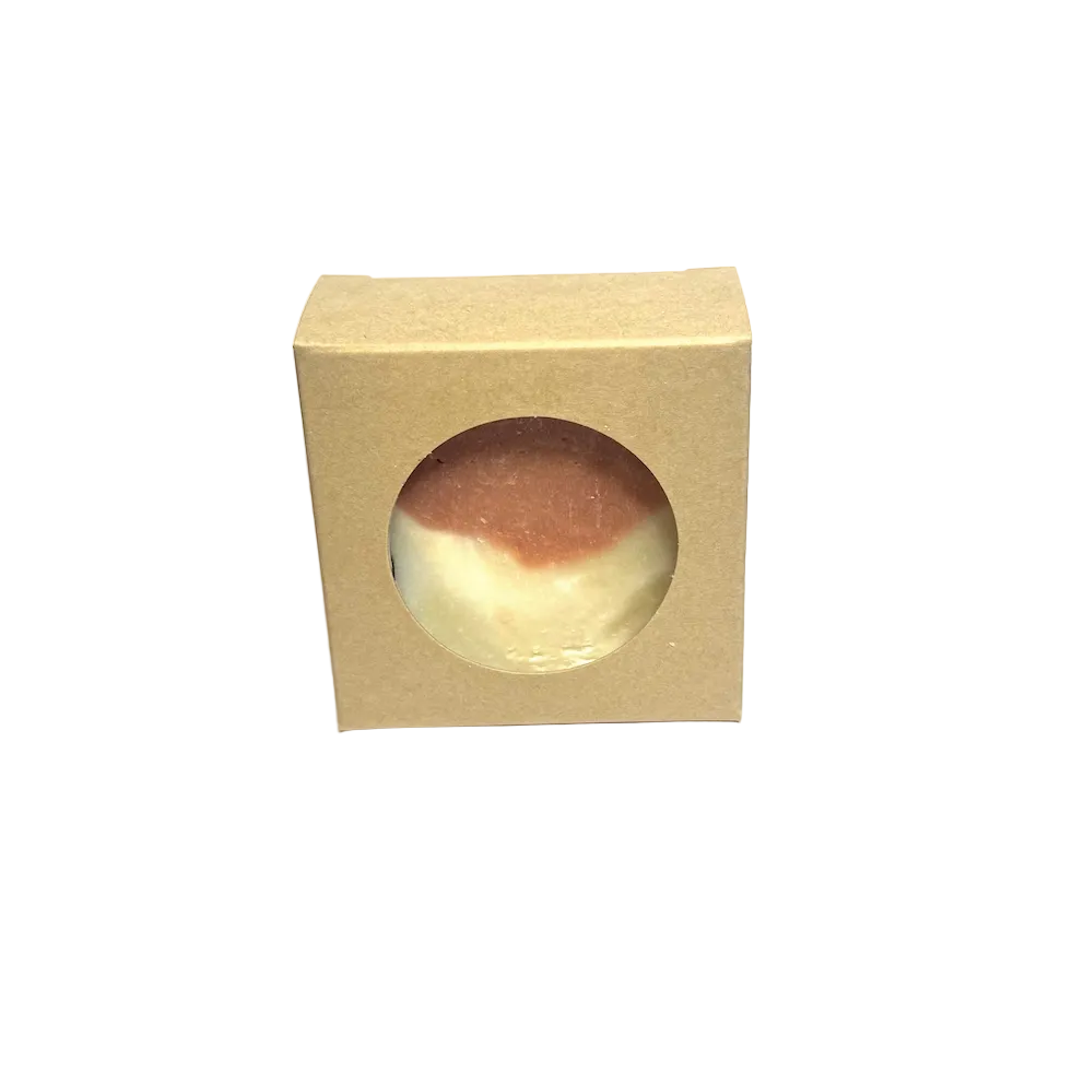 Bar of soap in a beige box on a gray background