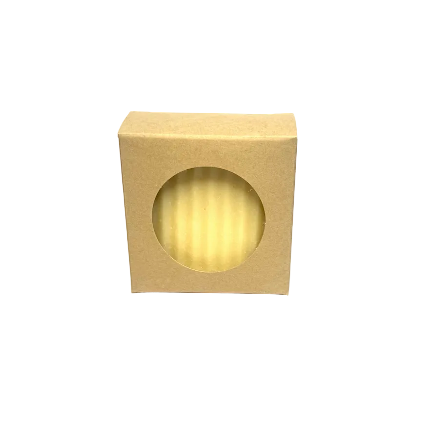 Beige soap bar in a box on a gray background