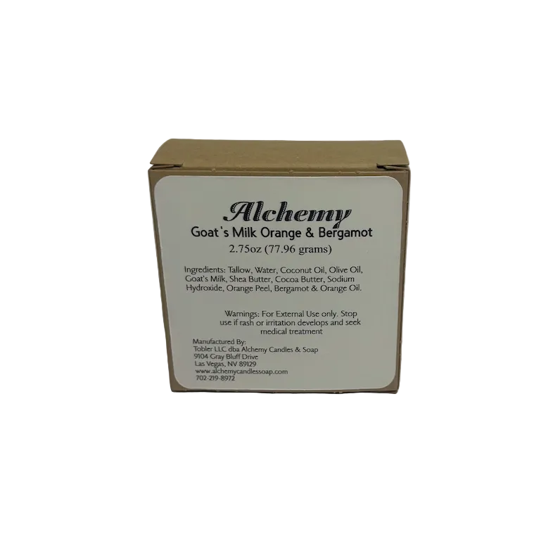 Box of Alchemy Goat's Milk Orange & Bergamot soap on a gray background