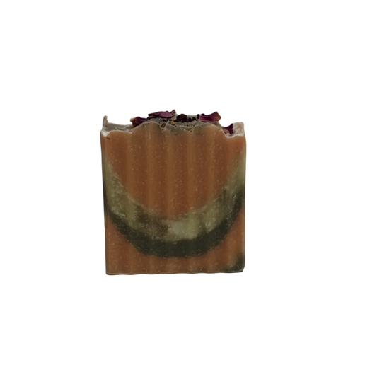 Multicolored soap bar on a plain background